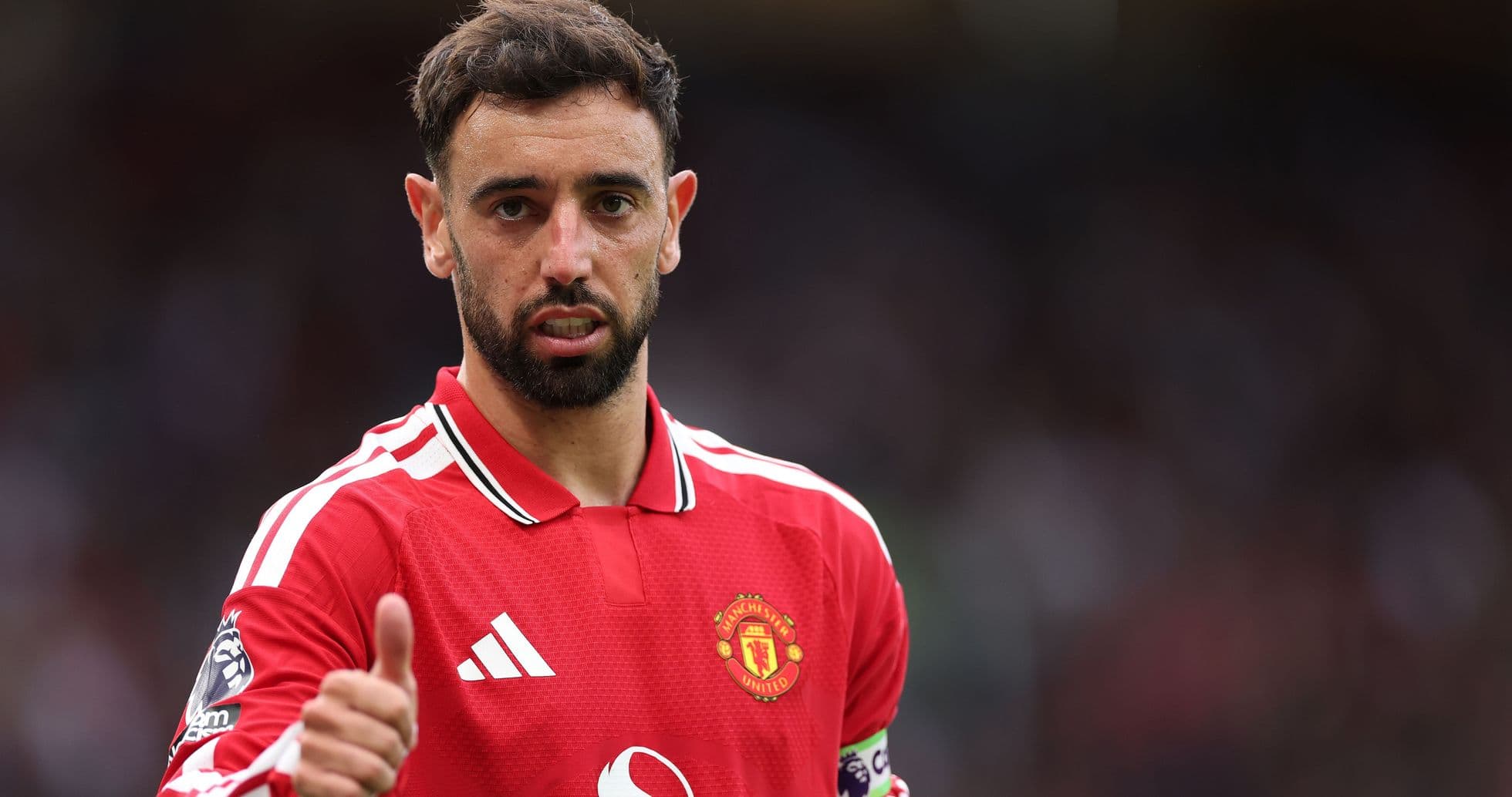 Bruno Fernandes in Manchester United jersey giving thumbs up