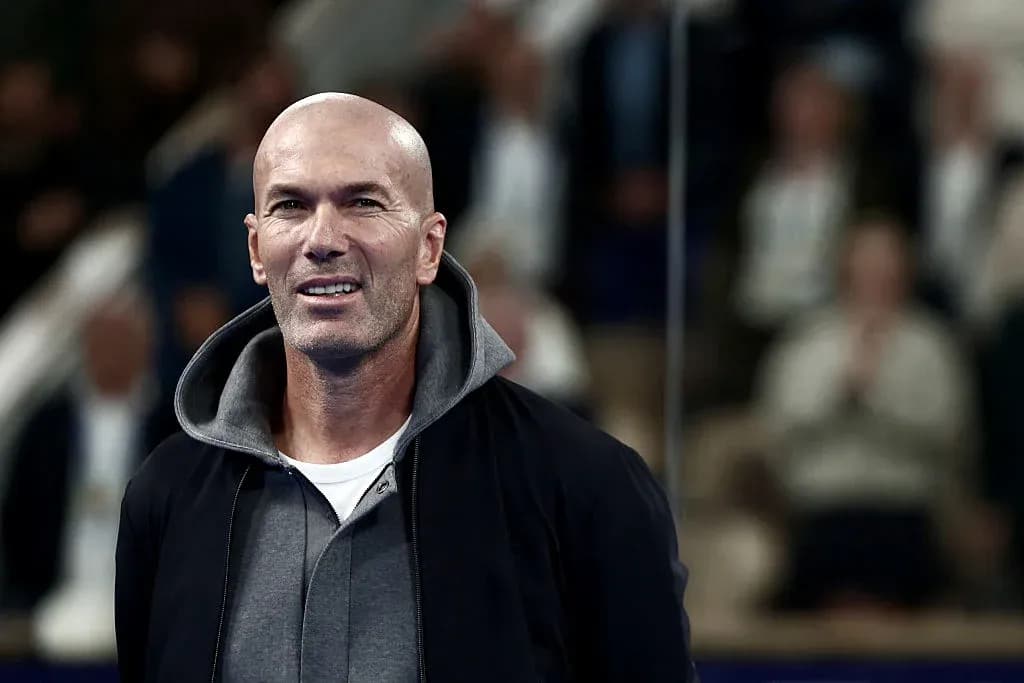 Man smiling while standing in a crowded venue Man smiling while standing in a crowded venue