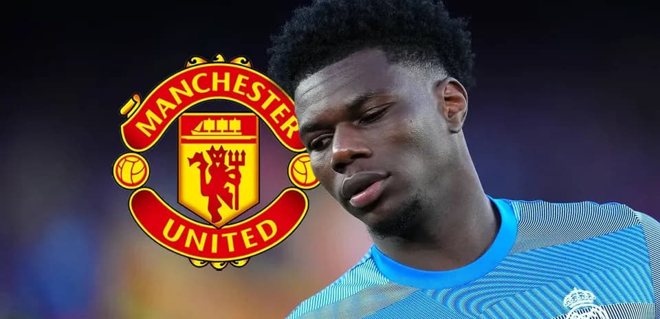 Player in jersey with Manchester United logo background