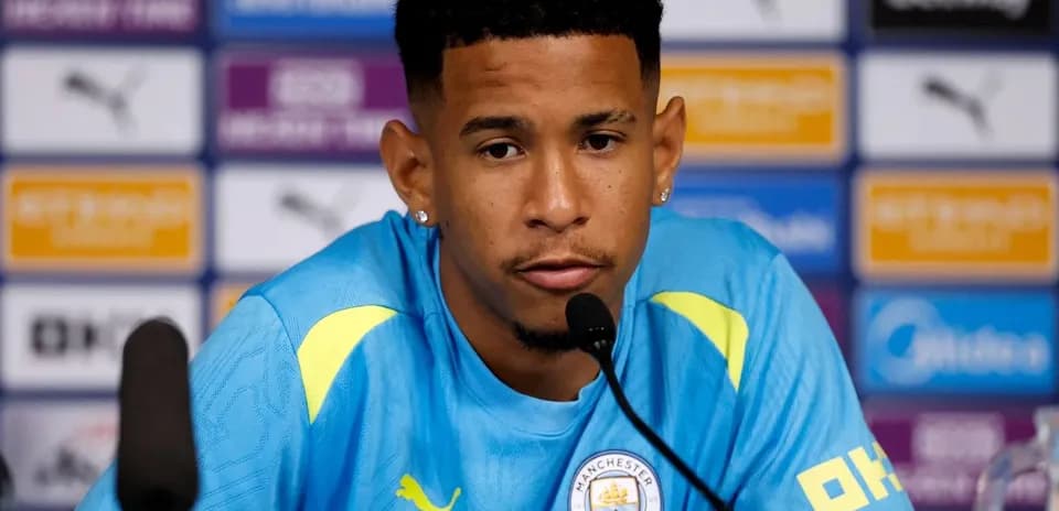 Player at press conference speaking into microphone