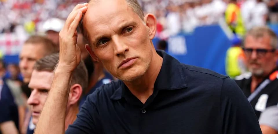 Coach observing match from the sidelines