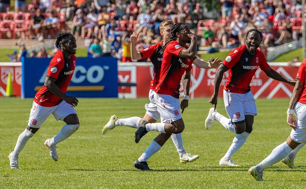 York United players celebrating a goal