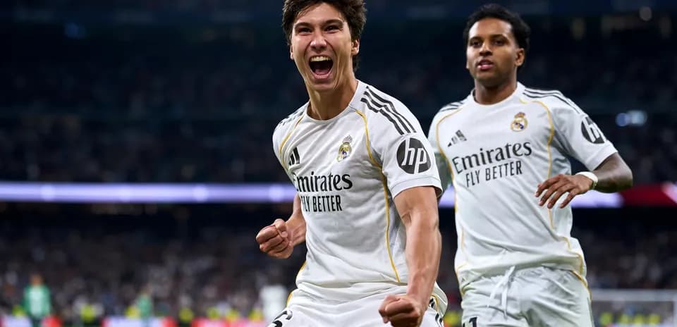 Real Madrid players celebrating a goal