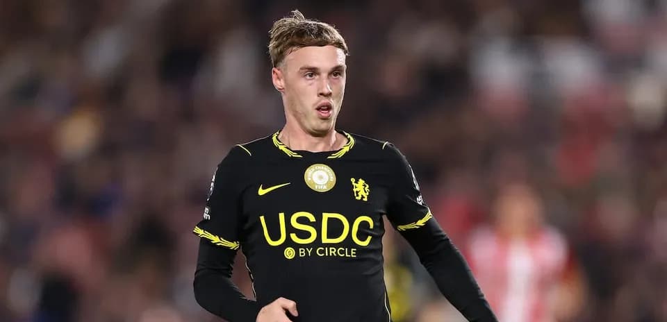 Player wearing black Chelsea kit during match