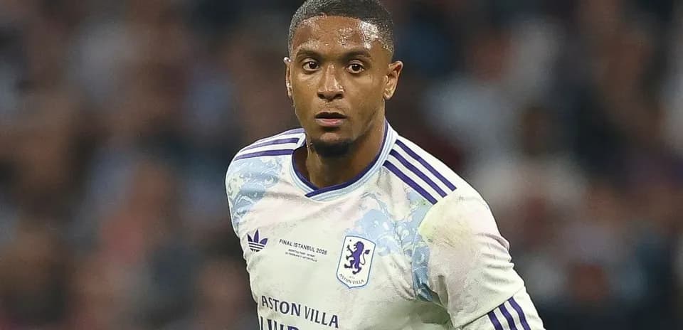 Player in Aston Villa jersey during match action