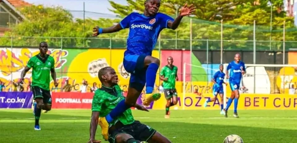 Player jumping over opponent during FKF Premier League match