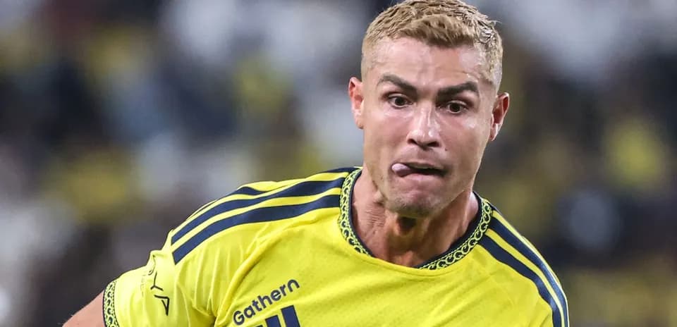 Player sprinting in yellow jersey during match