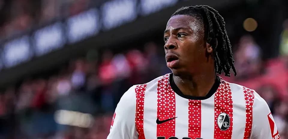 Player in striped jersey during match action