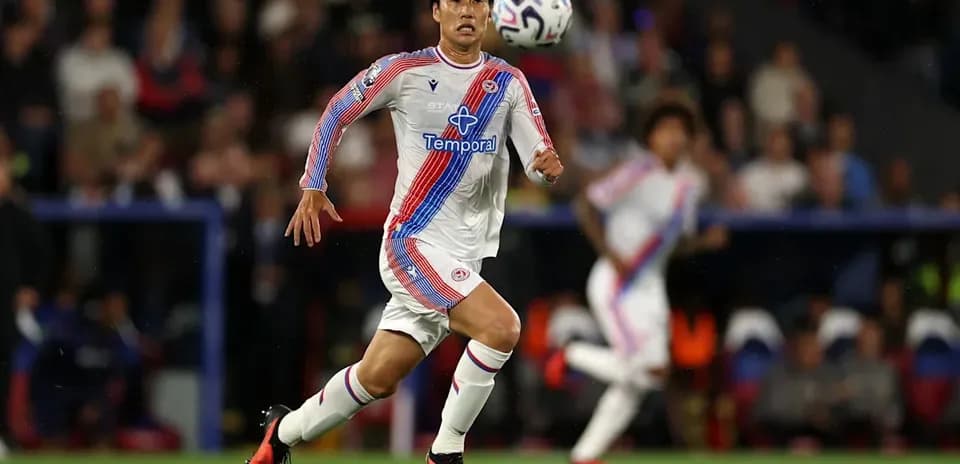 Player sprinting towards the ball during match