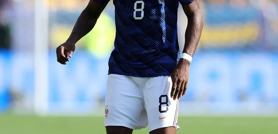 Player in France kit with ball during match