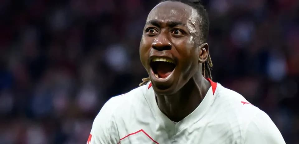 Player celebrating a goal with intense expression