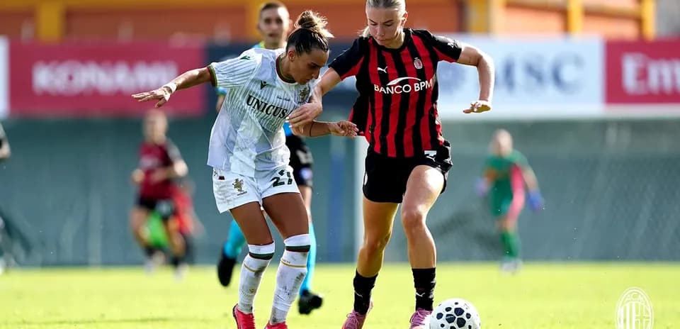 Player challenging for the ball during match