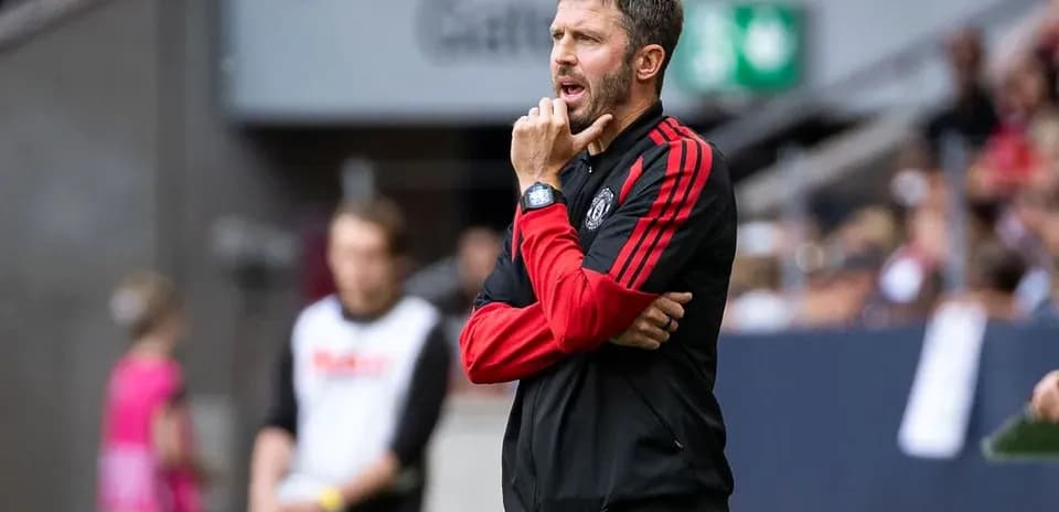 Coach observing the match from the sideline