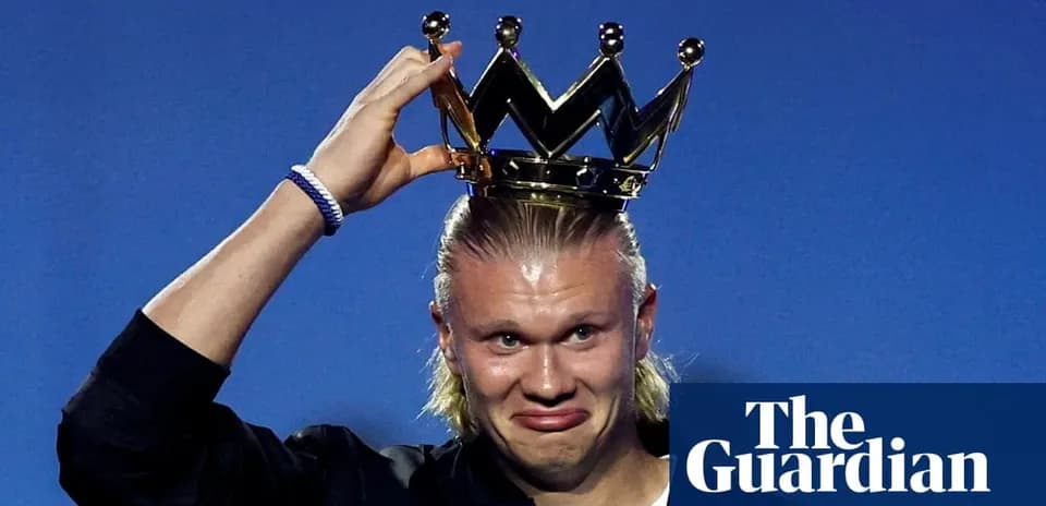 Player wearing a crown on stage at event