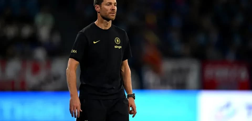 Coach on the sidelines during a match