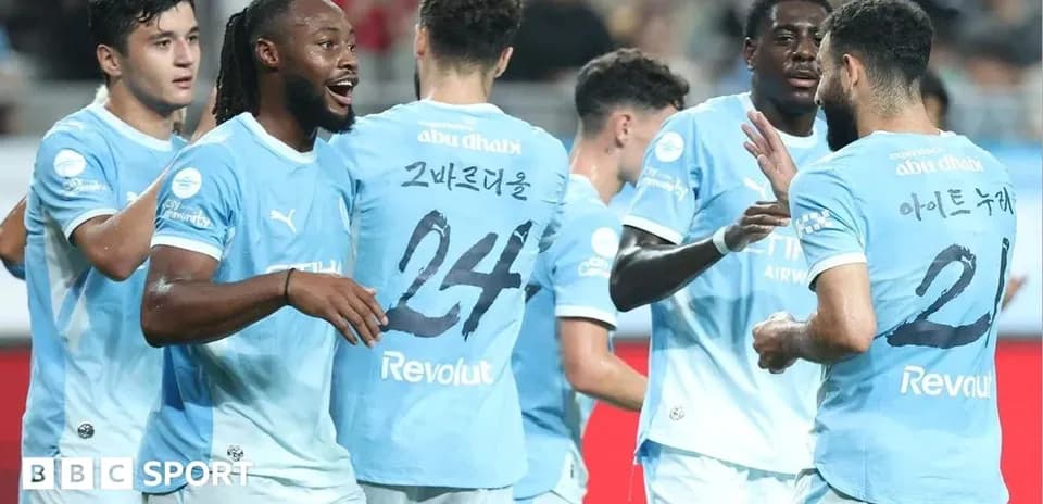 Players celebrating together during a football match