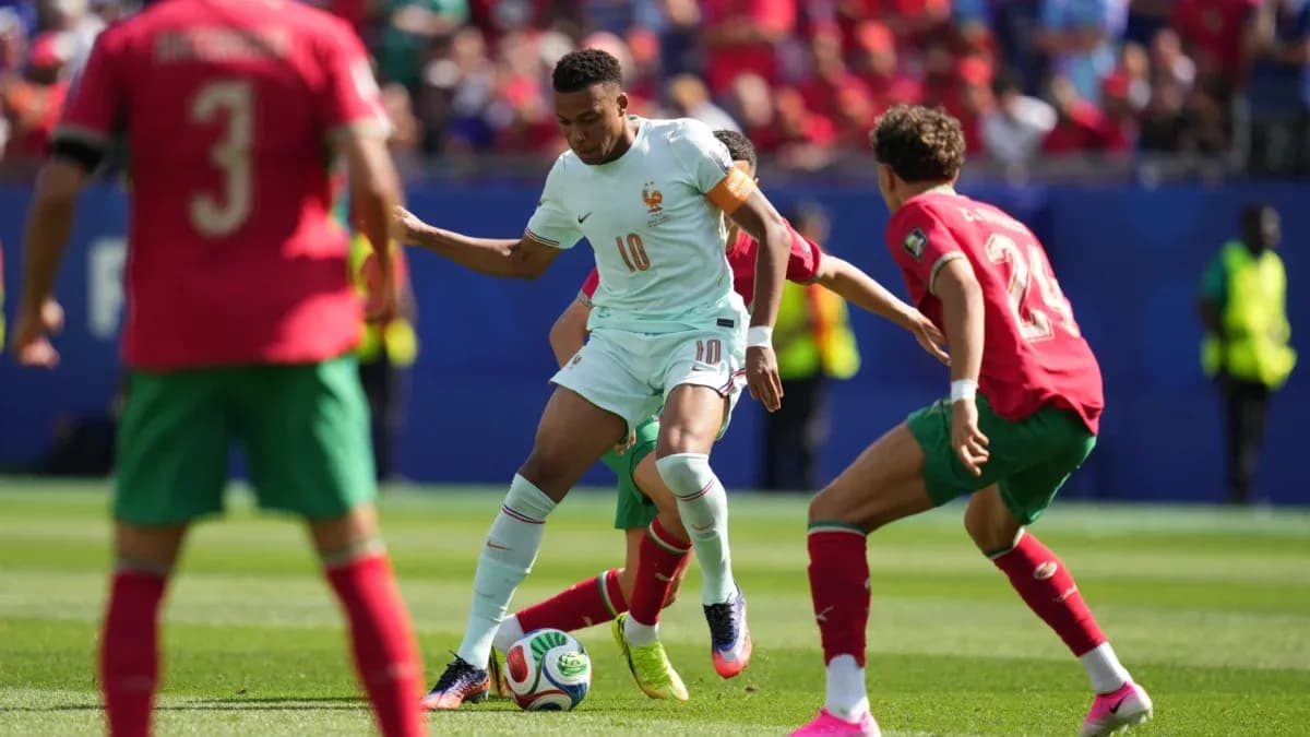Player dribbling the ball during France vs Morocco match