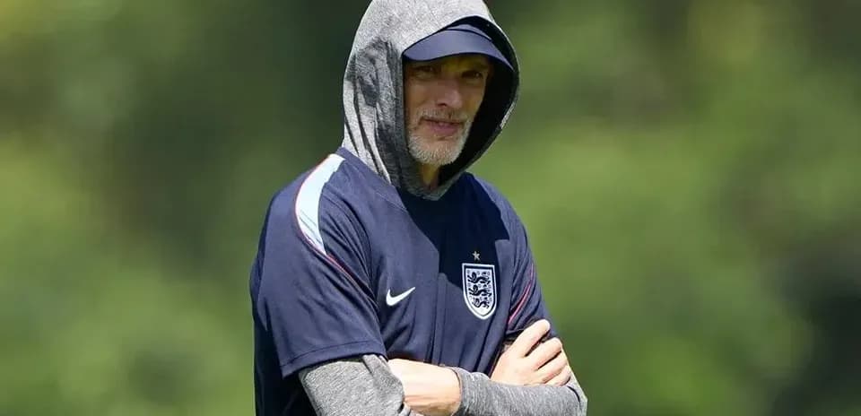 Coach wearing hoodie during training session