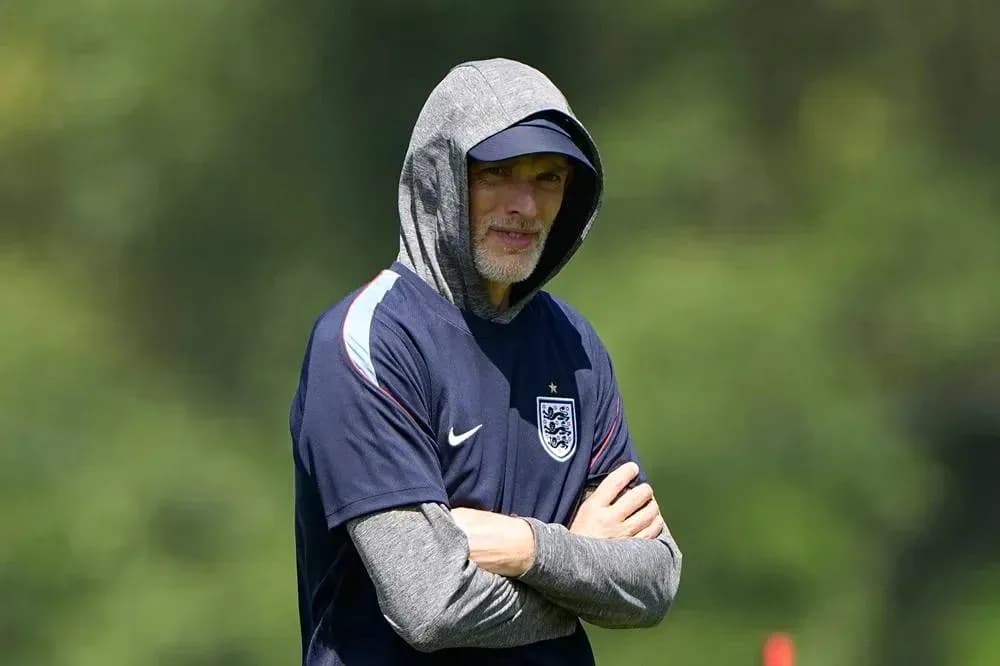 Coach wearing hoodie during training session