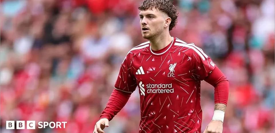 Player in Liverpool kit during match at stadium