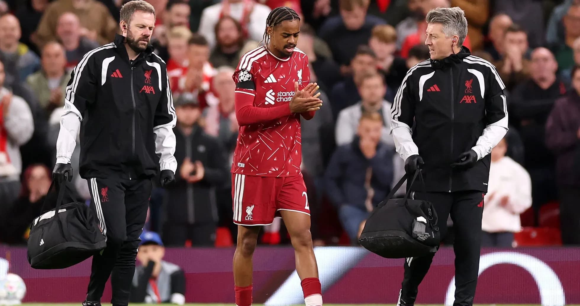 Player receiving medical attention during match at Anfield