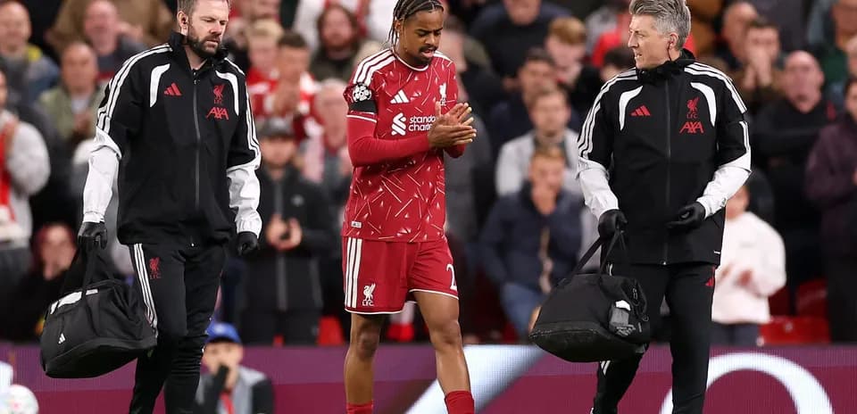 Player receiving medical attention during match at Anfield