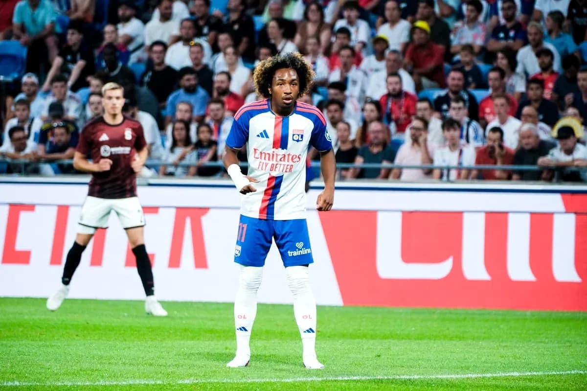 Player in Lyon kit during match on the field