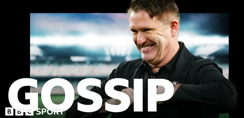 Football coach smiling with stadium in background