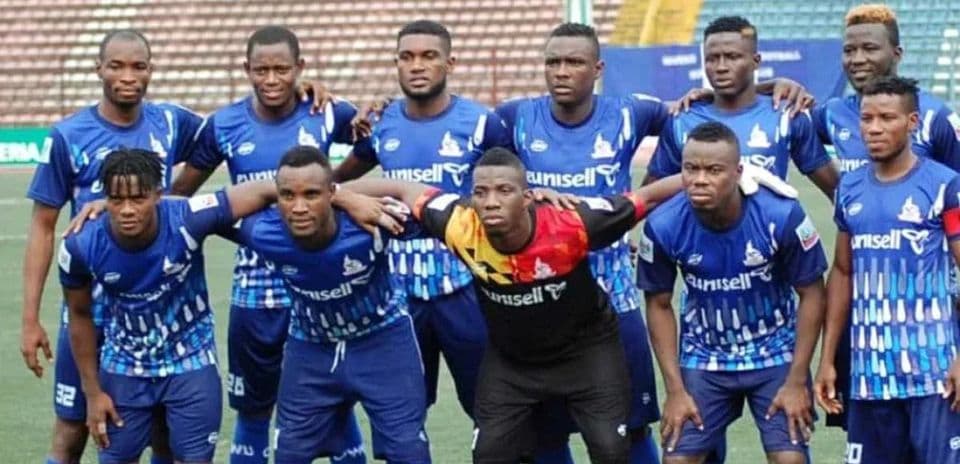 Rivers United team posing before the match