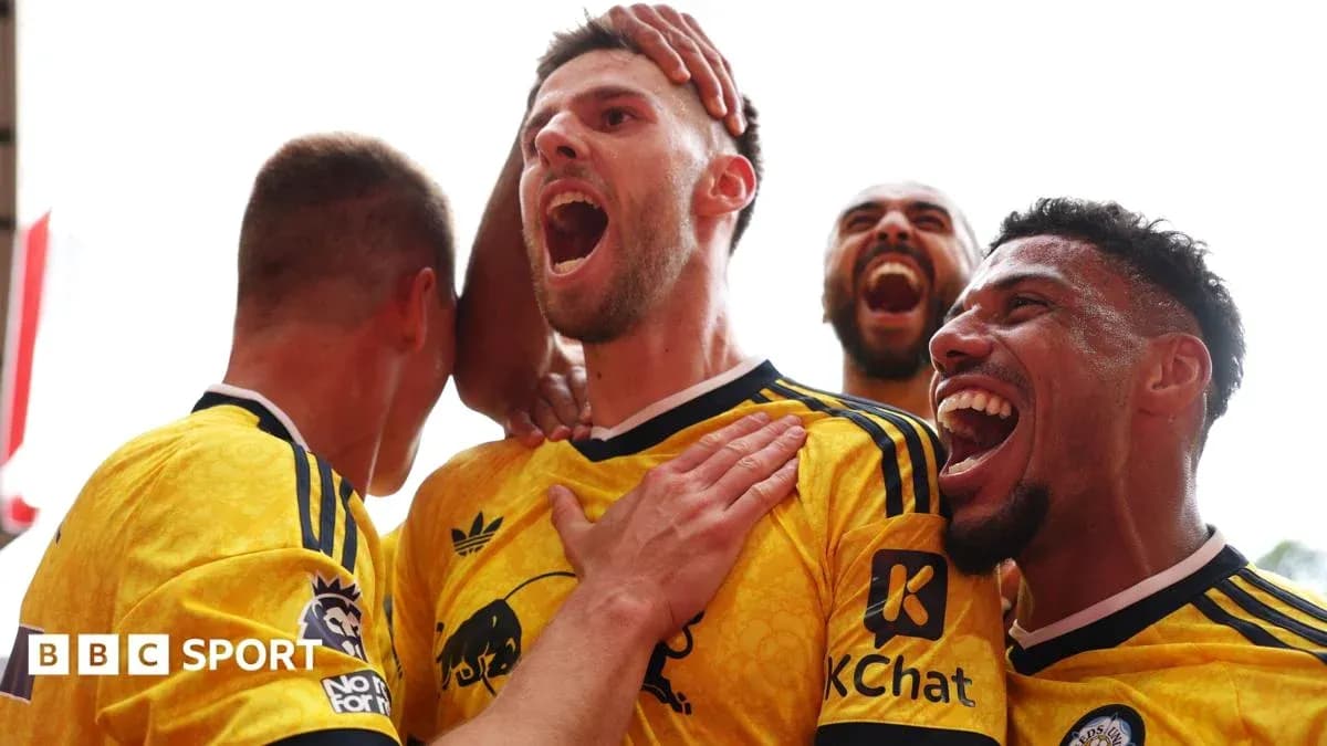 Players celebrating a goal with excitement