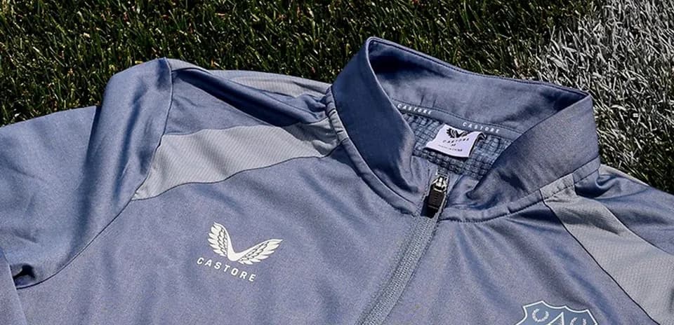 Everton training jacket on grass surface