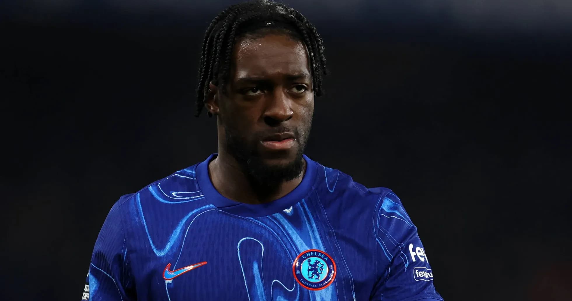 Player in blue Chelsea kit during match