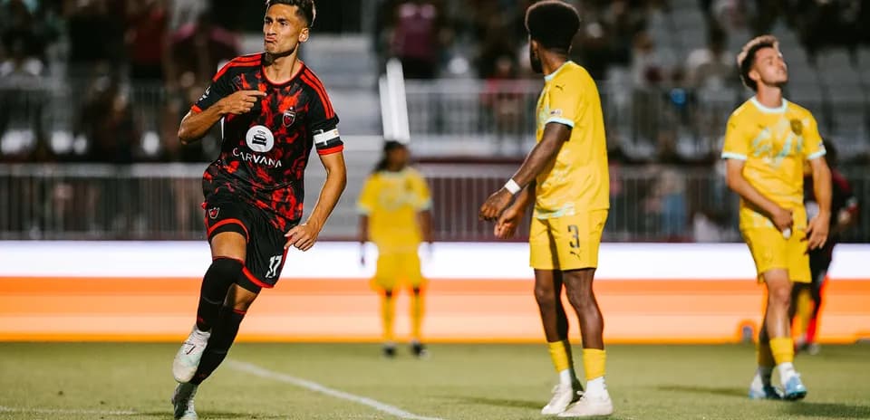 Player celebrating a goal during match