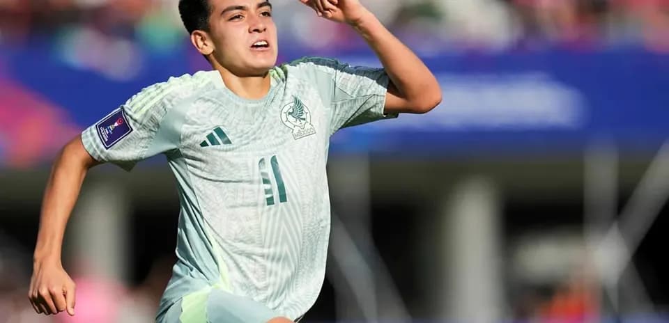 Mexican player celebrating during football match