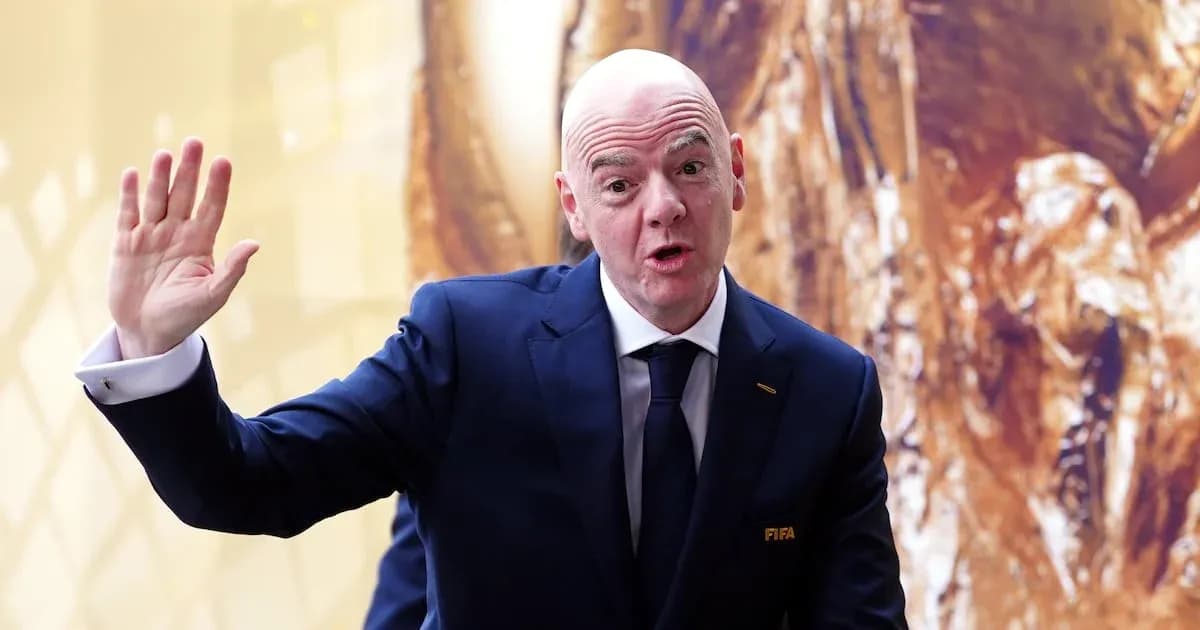 FIFA official gesturing during an event