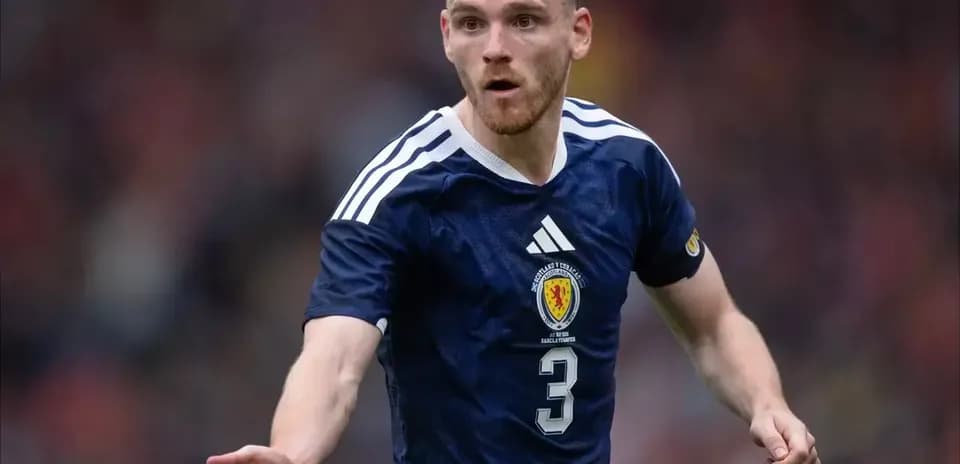 Scottish player gesturing during a football match