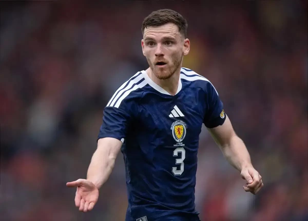 Scottish player gesturing during a football match