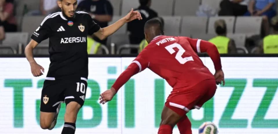 CSKA Sofia player tackling Qarabag opponent