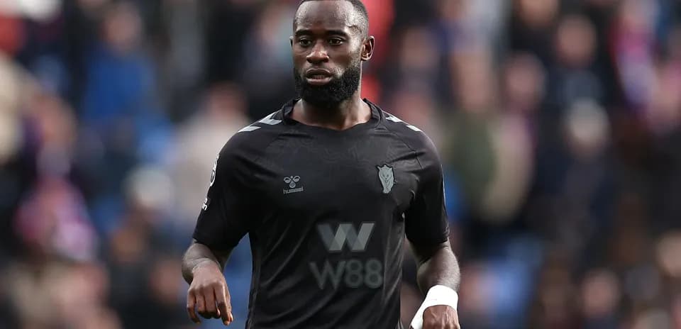 Player in black kit during a match