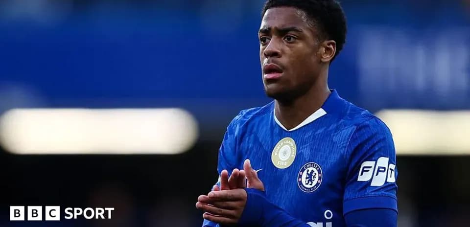 Chelsea player clapping during match on field