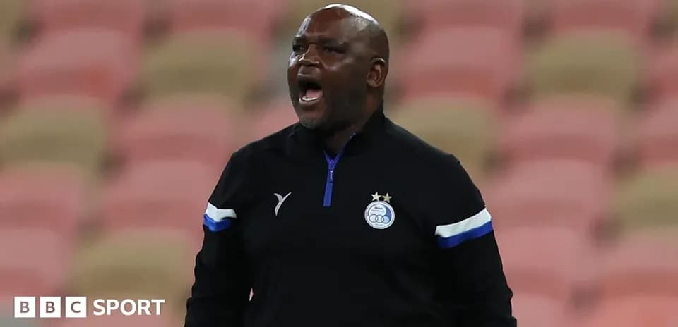 Coach shouting instructions during a match