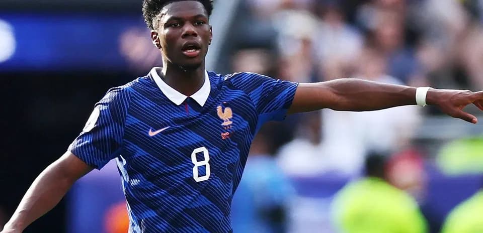 Player gesturing during a match wearing France jersey