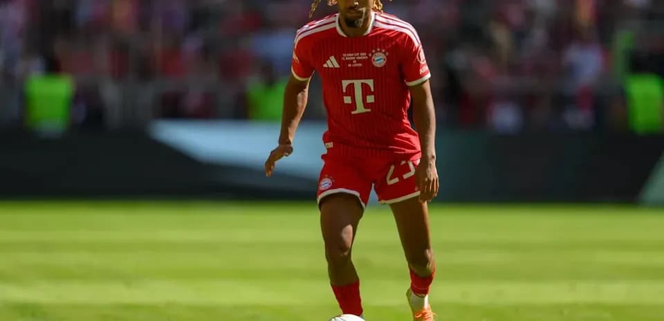 Player dribbling the ball on the field