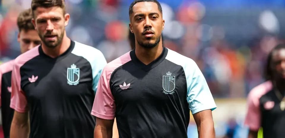 Players walking onto the field in team uniforms