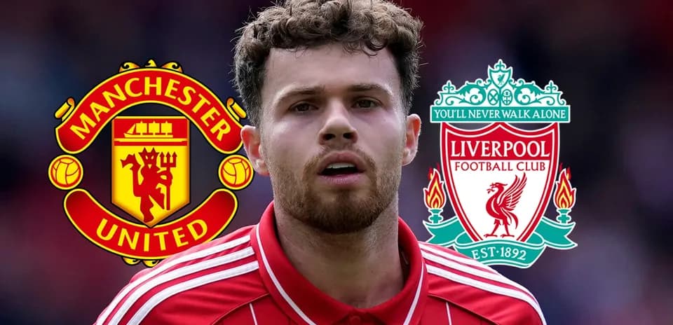 Player in red kit with Manchester United and Liverpool logos