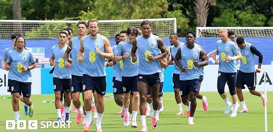 England team jogging during training session on pitch