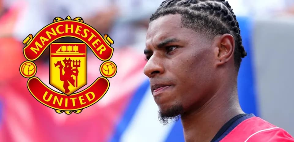 Player in Manchester United jersey with braided hair