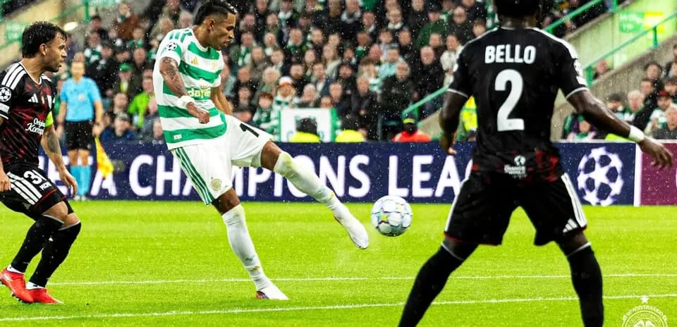 Celtic player kicking the ball in Champions League