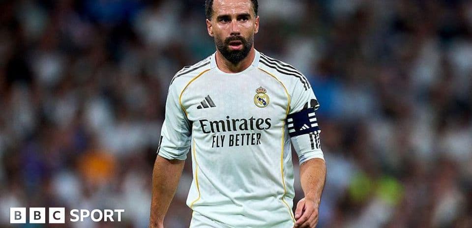 Player wearing Real Madrid kit on the pitch
