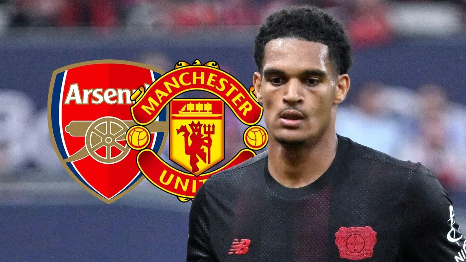 Player in black kit with Arsenal and Manchester United logos
